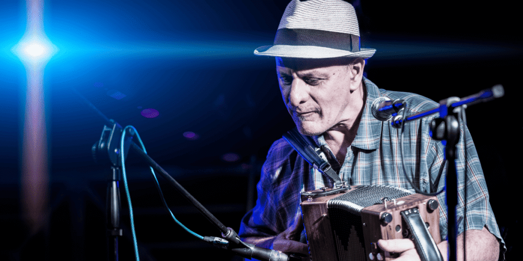 A Cajun musician playing Zydeco music on an accordion in Thibodaux, Louisiana